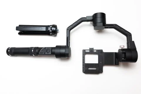 DSLR camera gimbal three-axis motorized stabilizer tripod system Stock Photos