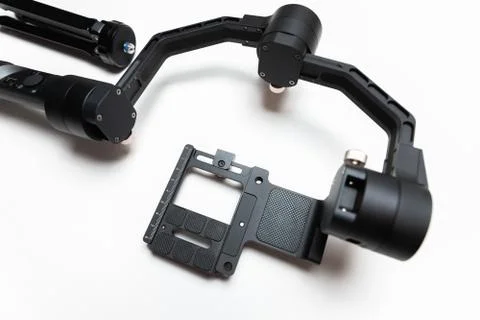 DSLR camera gimbal three-axis motorized stabilizer tripod system Stock Photos