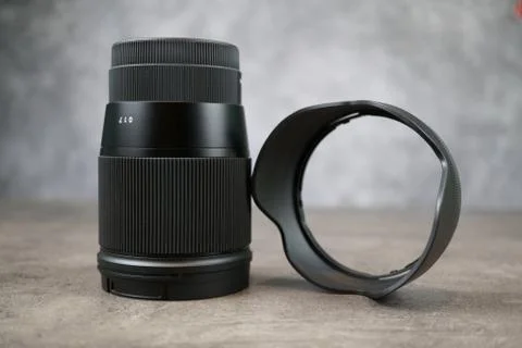 Dslr camera lense, close-up view on table with smooth background Stock Photos