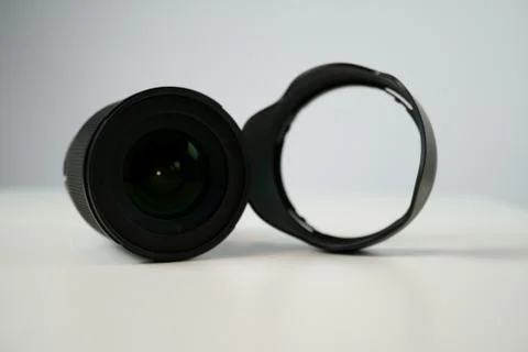 Dslr camera lense, close-up view on table with smooth background Stock Photos