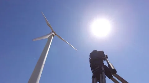 Dslr camera making timelapse eolic windmill turbine 4k Stock Footage 65247215
