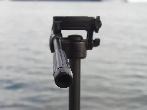 Dslr digital professional camera stand on tripod photographing sea, Stock Photos
