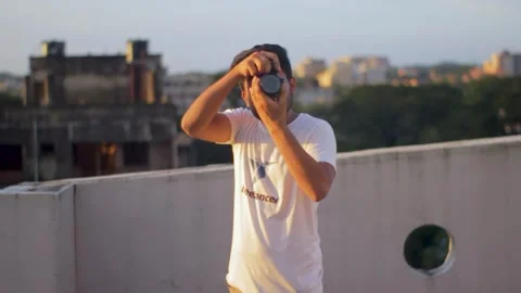 DSLR Photographer Capturing Photo Stock Footage 296484366