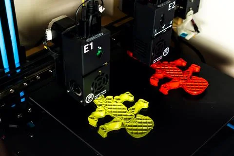 Dual extruder 3d printer which is printing two bicolor model, idex technology 写真素材