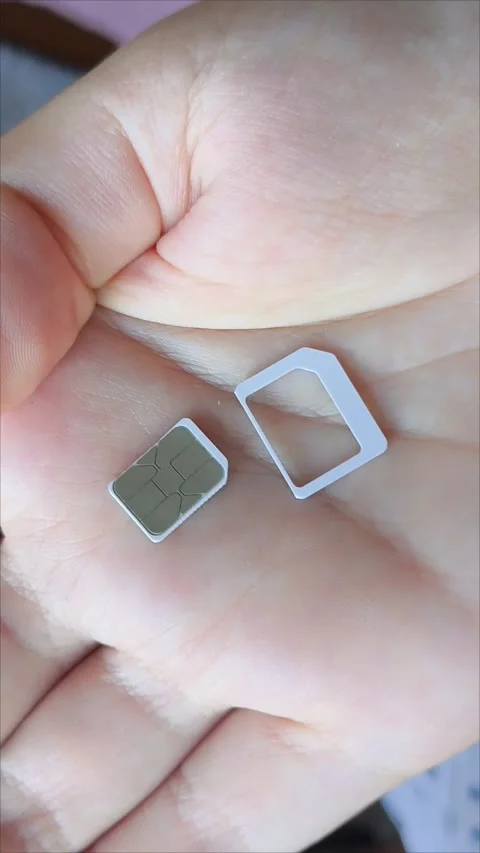 Dual nano Sim card on a smartphone Stock Footage 313355416