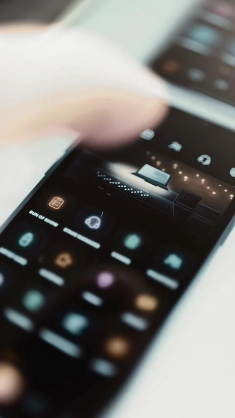 Dual smartphones present comprehensive event operations controls Stock Footage 346037603