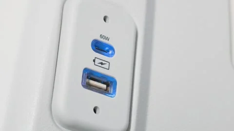 Dual USB Type C and Type A Smart Charging Ports on Modern Seat Console Stock Footage 347247812
