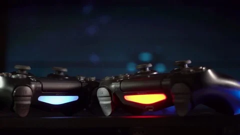 DualShock 4 controllers and VR headset o... | Stock Video | Pond5