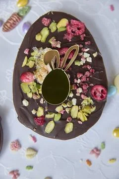 Dubai chocolate. Delicious Chocolate Easter Egg Holds A Sweet Surprise Stock Photos