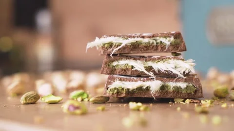 Dubai chocolate topped with roasted nuts Stock Footage 313548558