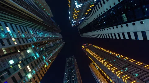 Dubai city night illumination apartment buildings up view 4k time lapse uae Stock Footage 54128775