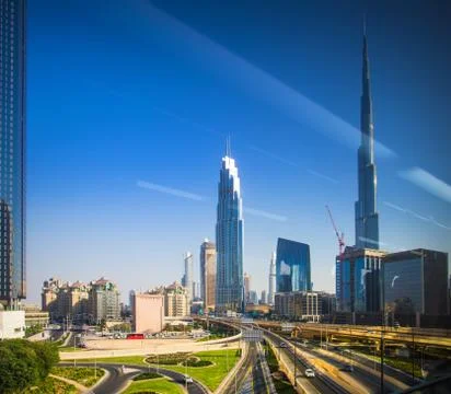 Dubai downtown view through window Stock Photos
