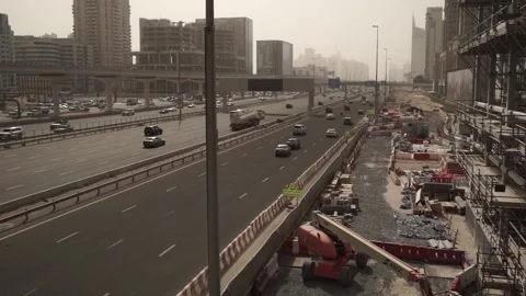 Dubai Highway next to construction site  Stock Footage 145844675