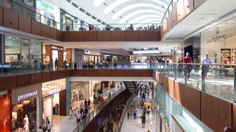 Dubai Mall, interior inside, shoppers walk around the store. Stock Footage 145497827