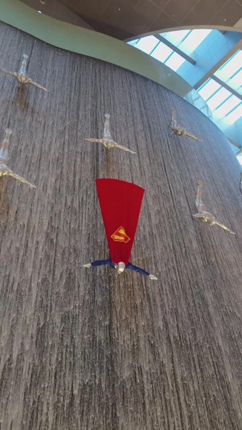 Dubai mall waterfall featuring superman Stock Footage 323272842