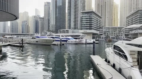 Dubai marina mall back side boats  Stock Footage 233857060