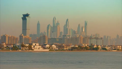 Dubai Marina Skyline View from Palm Jumeirah Waterfront at Golden Hour. Stock Footage 337910341