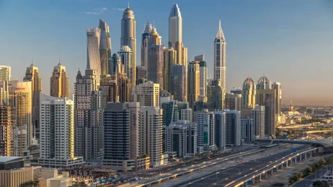 Dubai Marina skyscrapers aerial top view at sunrise from JLT in Dubai timelapse Stock Footage