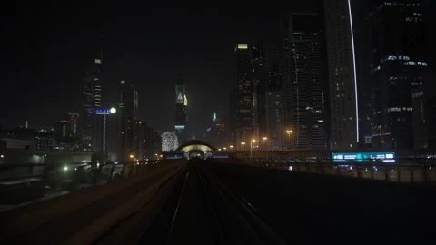 Dubai Metro passes KFC billboard in Dubai UAE Video stock 345006073