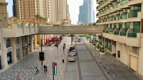 Dubai road with light traffic during day time. JBR walk. Top view Stock Footage 130329520
