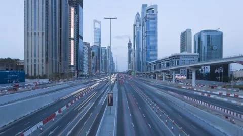 Dubai, Sheikh Zayed Rd at dusk with night traffic, UAE, T/Lapse Stock Footage 7735734
