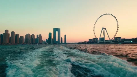 Dubai skyline with Ain Dubai at sunset. Stock Footage 305533706