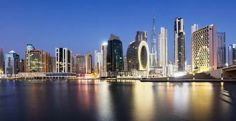 Dubai skyline with skyscraper and reflection in canal - nice cityscape in U.. Stock Photos