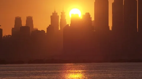Dubai Skyline with sun behind it - 3 Stock Footage 144754635