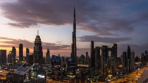 Dubai time lapse - skyline at sunset with Burj Khalifa,  aerial view, UAE Stock Footage 231965738