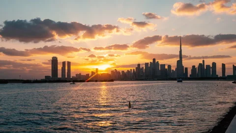 Dubai timelapse time lapse sunset epic city skyline over creek, cloudy, downtown Stock Footage 294513277