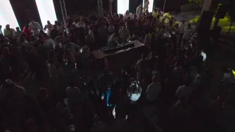 Dubai, UAE - 1 14 2023: A drone flies by in a nightclub during a music party Stock Footage 254049677