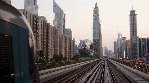 Dubai, UAE - 10th october, 2022: metro train on railway in Dubai with museu.. Stock-Footage 226460709