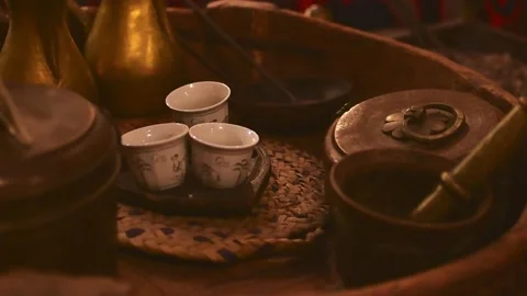 Dubai, UAE - 12th october, 2022: Top view coffee set up three cups and arab.. Stockbeeldmateriaal 227283826