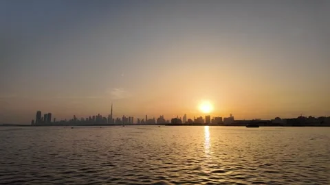 Dubai, UAE - 18 June 2026: Sunset view of Burj Khalifa skyline from Dubai C.. Stock Footage 337172892