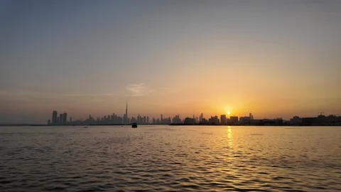 Dubai, UAE - 18 June 2026: Sunset view of Burj Khalifa skyline from Dubai C.. Stock Footage 337172984
