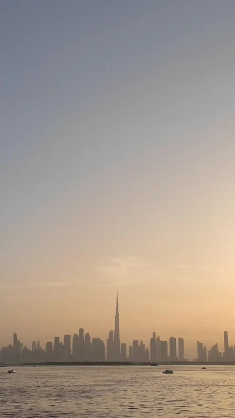 Dubai, UAE - 18 June 2026: Sunset view of Burj Khalifa skyline from Dubai C.. Stock Footage 337175296