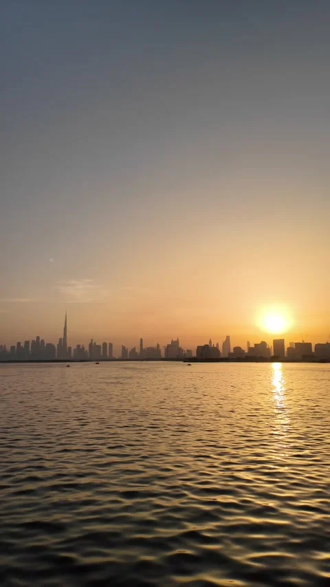 Dubai, UAE - 18 June 2026: Sunset view of Burj Khalifa skyline from Dubai C.. Stock Footage 337175360