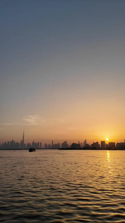 Dubai, UAE - 18 June 2026: Sunset view of Burj Khalifa skyline from Dubai C.. Stock Footage 337175514