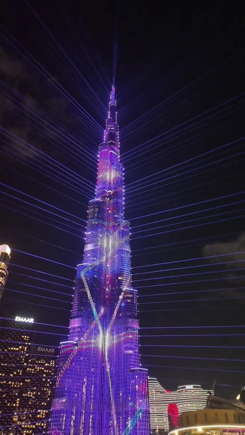 Dubai, UAE, 21 June 2026 - Multicolored laser light show on Burj Khalifa an.. Stock Footage 337345264