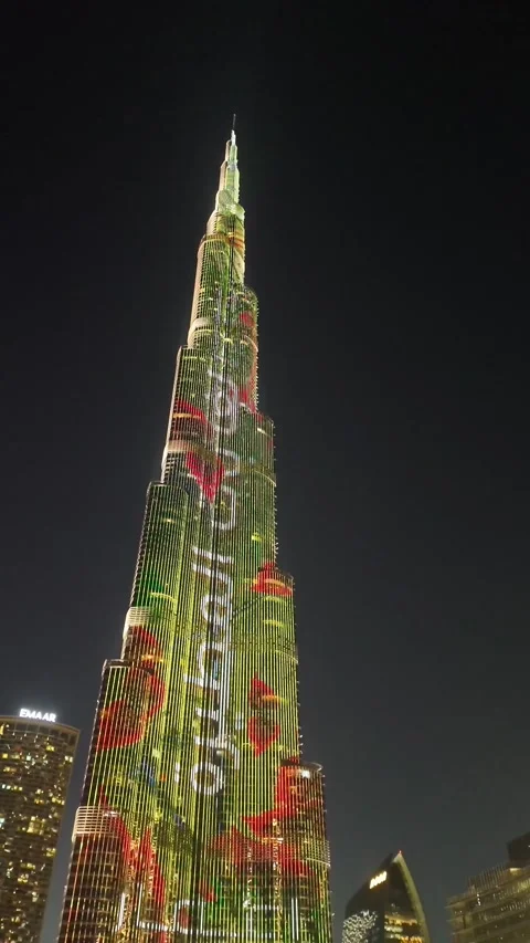 Dubai, UAE, 21 June 2026 - Multicolored laser light show on Burj Khalifa an.. Stock Footage 337345480