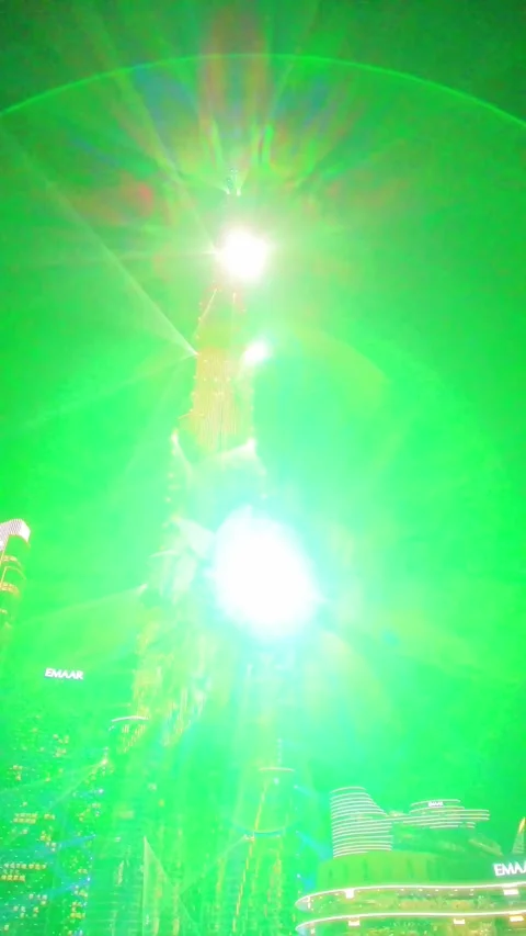 Dubai, UAE, 21 June 2026 - Multicolored laser light show on Burj Khalifa an.. Stock Footage 337345482