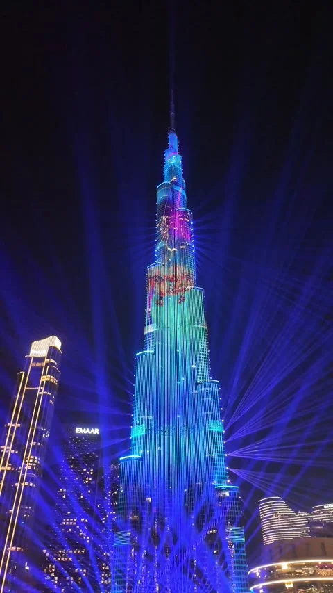 Dubai, UAE, 21 June 2026 - Multicolored laser light show on Burj Khalifa an.. Stock Footage 337345486