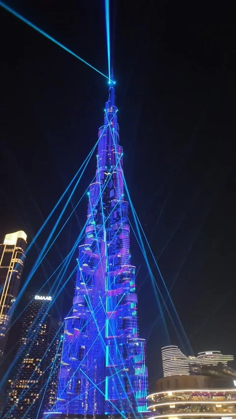 Dubai, UAE, 21 June 2026 - Multicolored laser light show on Burj Khalifa an.. Stock Footage 337345698