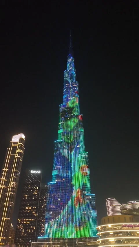 Dubai, UAE, 21 June 2026 - Multicolored laser light show on Burj Khalifa an.. Stock Footage 337345699