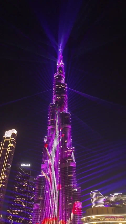 Dubai, UAE, 21 June 2026 - Multicolored laser light show on Burj Khalifa an.. Stock Footage 337345701