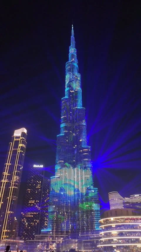 Dubai, UAE, 21 June 2026 - Multicolored laser light show on Burj Khalifa an.. Stock Footage 337345706