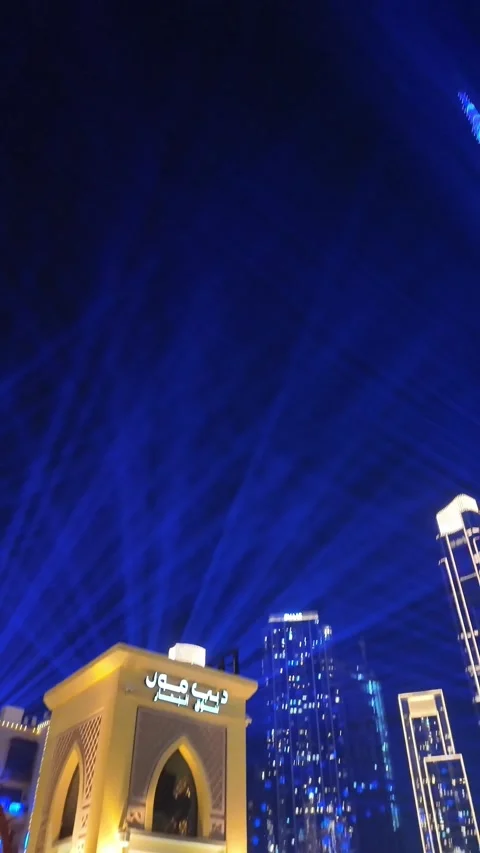 Dubai, UAE, 21 June 2026 - Multicolored laser light show on Burj Khalifa an.. Stock Footage 337346055