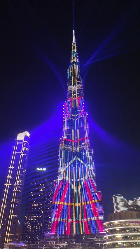 Dubai, UAE, 21 June 2026 - Multicolored laser light show on Burj Khalifa an.. Stock Footage 337346076