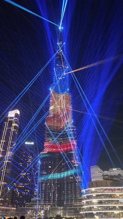 Dubai, UAE, 21 June 2026 - Multicolored laser light show on Burj Khalifa an.. Stock Footage 337346094