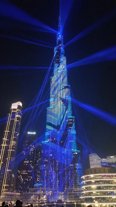 Dubai, UAE, 21 June 2026 - Multicolored laser light show on Burj Khalifa an.. Stock Footage 337346128